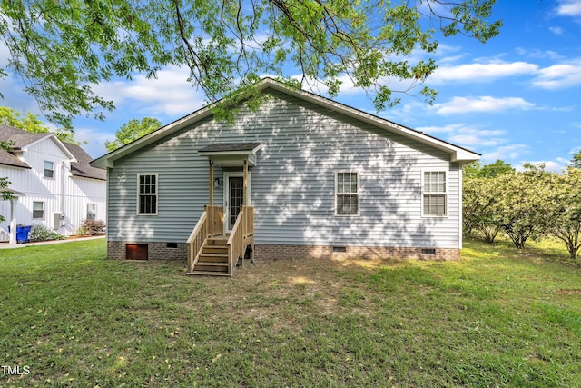 exterior space with a yard and crawl space