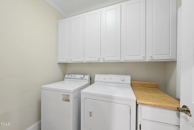 406 N Wakefield St, Zebulon, NC 27597 - laundry area featuring independent washer and dryer, cabinet space, and ornamental molding