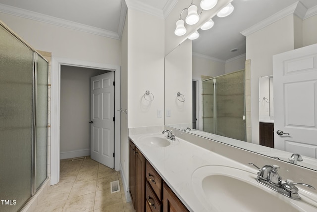 406 N Wakefield St, Zebulon, NC 27597 - bathroom with a stall shower, ornamental molding, double vanity, and baseboards