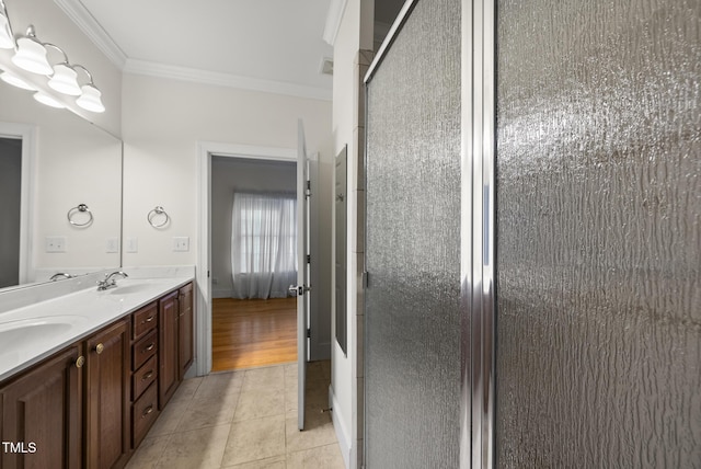 406 N Wakefield St, Zebulon, NC 27597 - full bathroom with ornamental molding, tile patterned flooring, a stall shower, and double vanity
