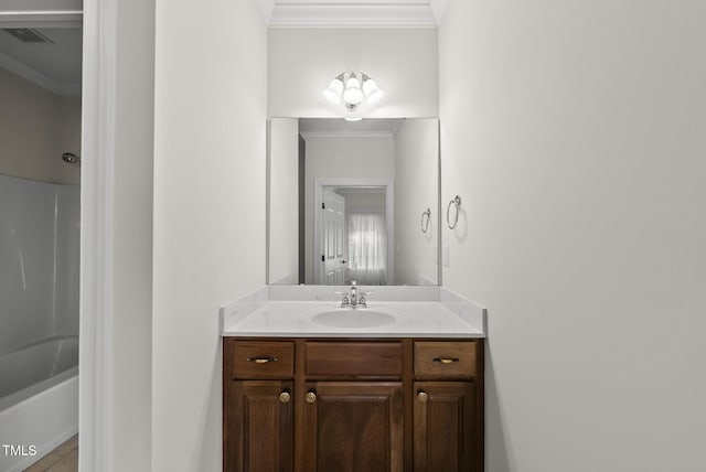 406 N Wakefield St, Zebulon, NC 27597 - bathroom with ornamental molding, vanity, and shower / tub combination
