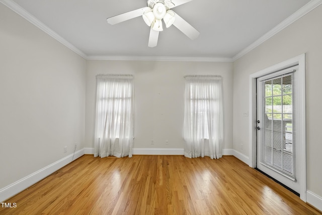 406 N Wakefield St, Zebulon, NC 27597 - unfurnished room with light wood-type flooring, ornamental molding, baseboards, and a ceiling fan