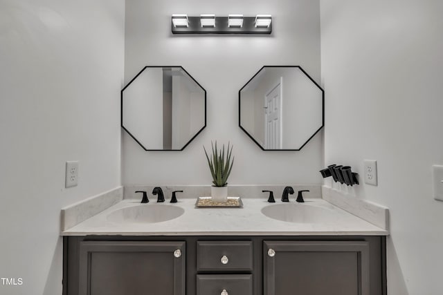 bathroom featuring double vanity