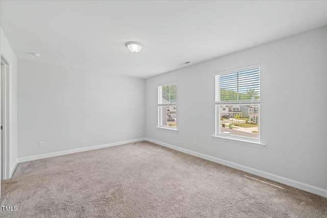 1005 Whispering Creek Ct, Knightdale, NC 27545 - empty room with carpet, visible vents, and baseboards