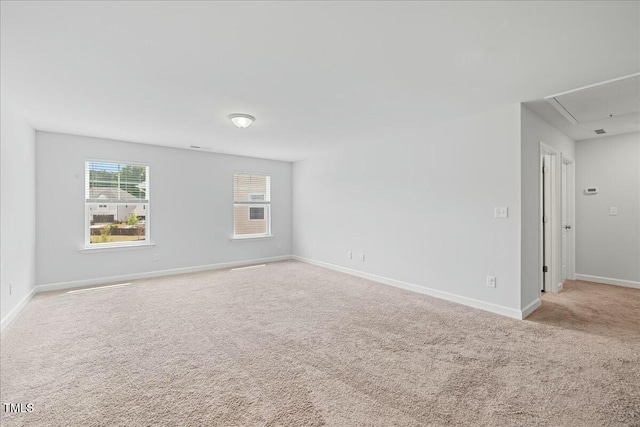 1005 Whispering Creek Ct, Knightdale, NC 27545 - unfurnished room featuring attic access, baseboards, and carpet