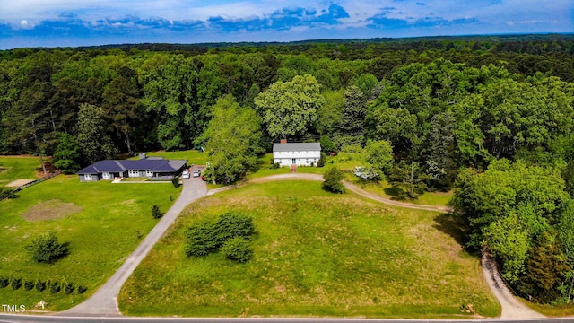 bird's eye view featuring a view of trees