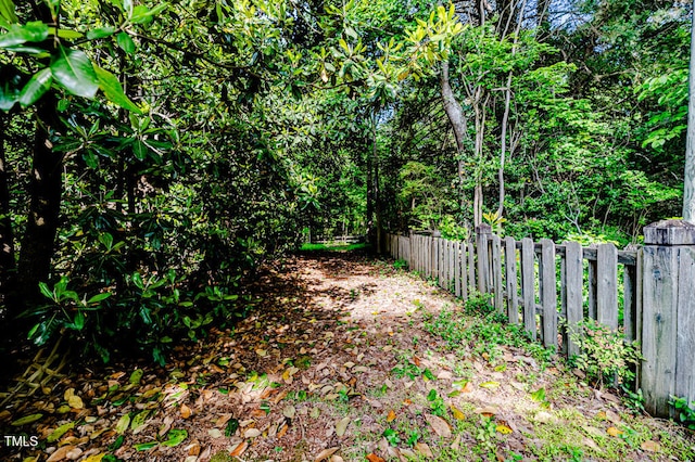 view of yard featuring fence