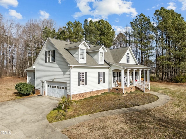 226 Fletcher Ridge Rd, Timberlake, NC 27583 - view of front of house featuring a porch, a garage, driveway, roof with shingles, and view of scattered trees