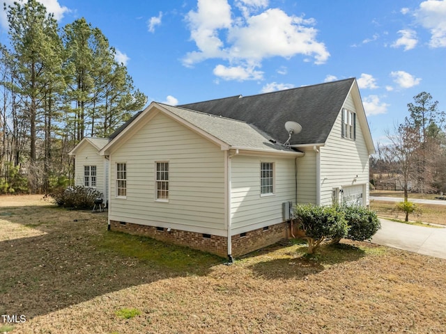 226 Fletcher Ridge Rd, Timberlake, NC 27583 - view of home's exterior featuring crawl space, an attached garage, roof with shingles, driveway, and a yard