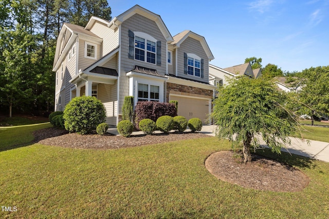 craftsman-style house with an attached garage, driveway, a front yard, and a standing seam roof