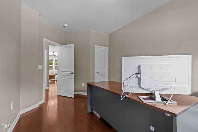 office featuring baseboards, dark wood finished floors, and lofted ceiling