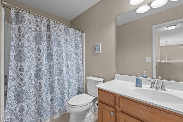 full bathroom featuring toilet, a shower with curtain, tile patterned flooring, and vanity