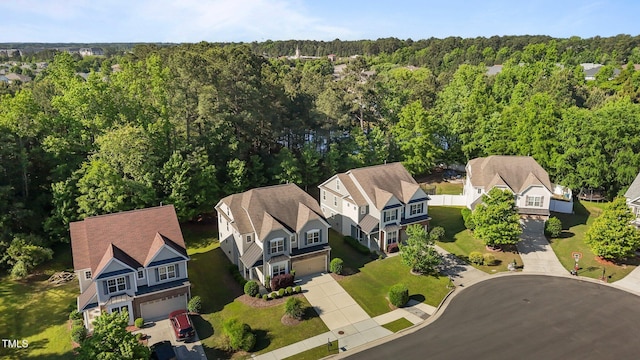 bird's eye view with a residential view and a forest view