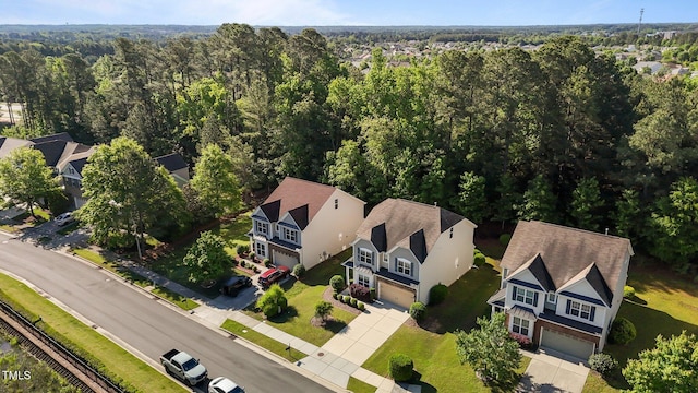 bird's eye view with a view of trees and a residential view