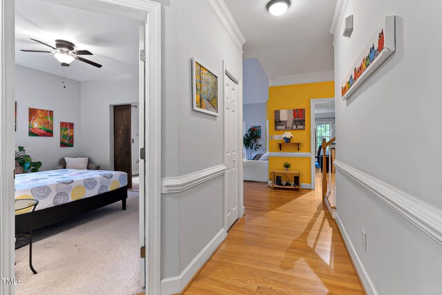 6 Chelan Ct, Durham, NC 27713 - hallway featuring crown molding, light wood finished floors, and baseboards