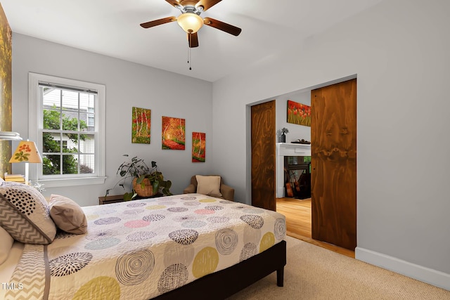 6 Chelan Ct, Durham, NC 27713 - bedroom featuring a ceiling fan, baseboards, and light colored carpet