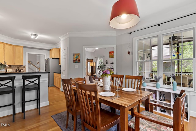 6 Chelan Ct, Durham, NC 27713 - dining space with light wood finished floors and crown molding