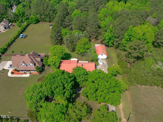 aerial view with a wooded view