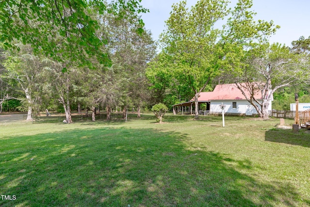 view of yard featuring fence