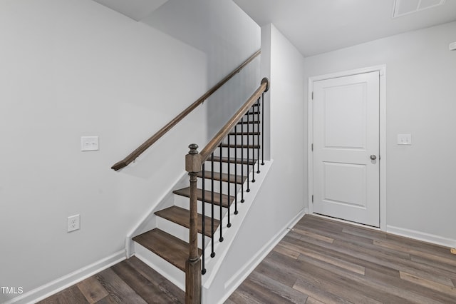 321 Devon Cliffs Dr, Wake Forest, NC 27587 - stairway featuring wood finished floors and baseboards