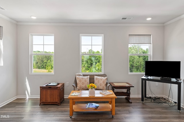 321 Devon Cliffs Dr, Wake Forest, NC 27587 - living area with crown molding, healthy amount of natural light, wood finished floors, baseboards, and recessed lighting
