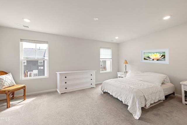 321 Devon Cliffs Dr, Wake Forest, NC 27587 - carpeted bedroom featuring multiple windows, baseboards, and recessed lighting