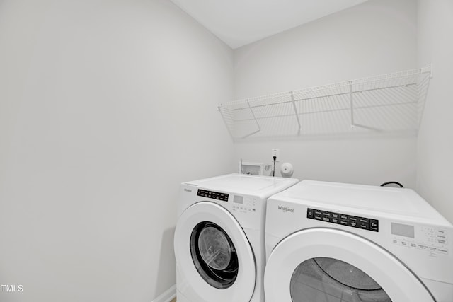 laundry area featuring laundry area and washing machine and dryer
