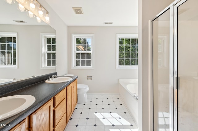 full bath featuring visible vents, a sink, and toilet