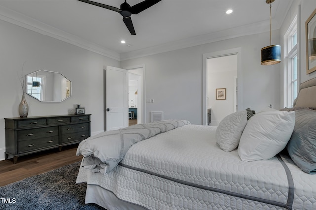 bedroom featuring dark wood finished floors, recessed lighting, ornamental molding, ceiling fan, and visible vents