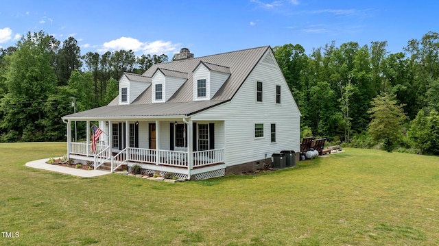 675 Anderson Creek Rd, Henderson, NC 27537 - cape cod home with covered porch, crawl space, a chimney, and a front lawn