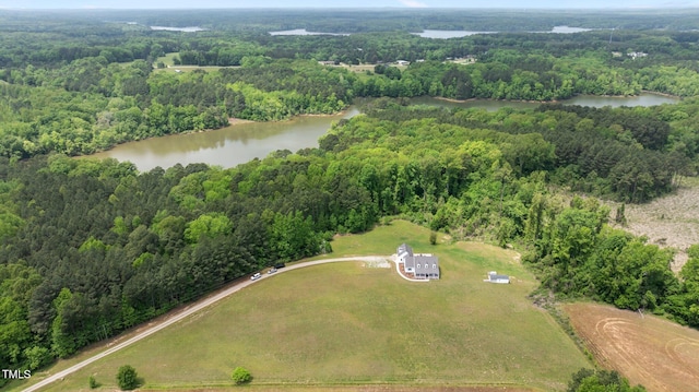 675 Anderson Creek Rd, Henderson, NC 27537 - drone / aerial view with a water view and a wooded view