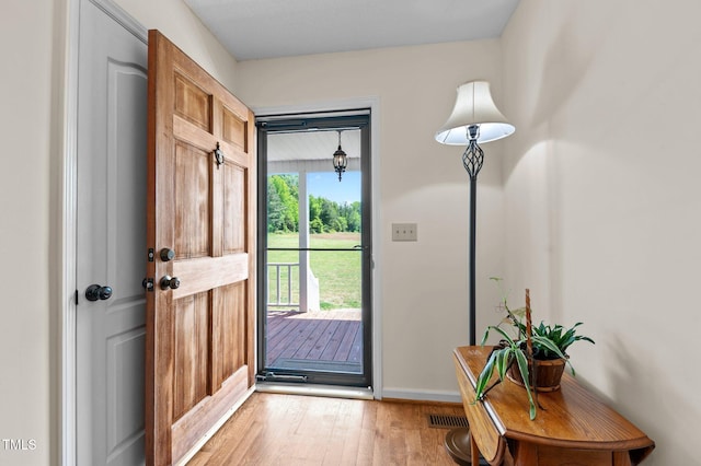 675 Anderson Creek Rd, Henderson, NC 27537 - entryway with baseboards, visible vents, and light wood-style floors
