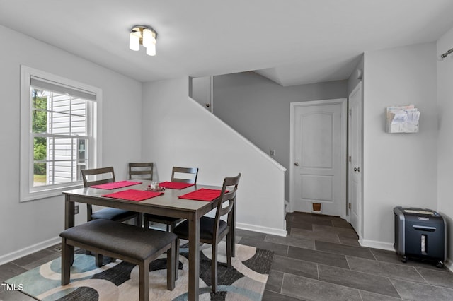 675 Anderson Creek Rd, Henderson, NC 27537 - dining area featuring baseboards and stairs