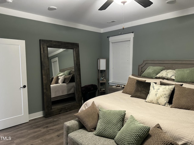 bedroom with visible vents, ceiling fan, dark wood-style flooring, and baseboards