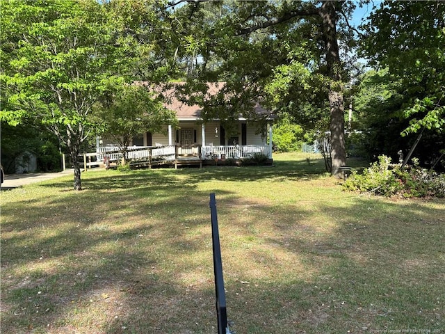 3903 Daytona Rd, Fayetteville, NC 28311 - view of grassy yard with covered porch