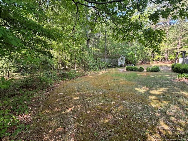 3903 Daytona Rd, Fayetteville, NC 28311 - view of yard featuring a wooded view