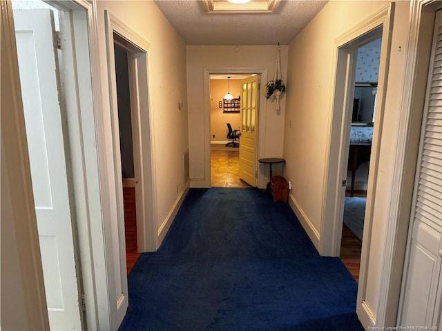 3903 Daytona Rd, Fayetteville, NC 28311 - hallway with carpet, baseboards, and a textured ceiling