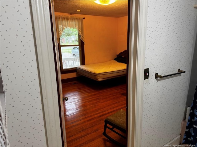 3903 Daytona Rd, Fayetteville, NC 28311 - bedroom with wood finished floors and wallpapered walls