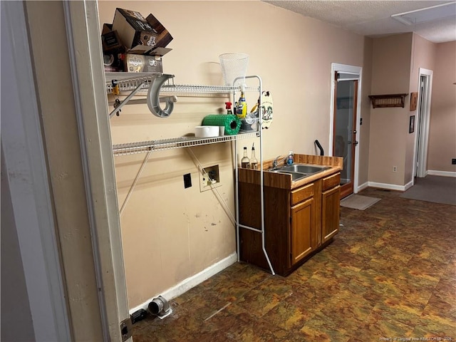 3903 Daytona Rd, Fayetteville, NC 28311 - clothes washing area featuring washer hookup and baseboards