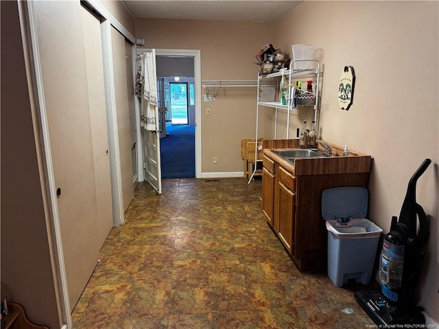 3903 Daytona Rd, Fayetteville, NC 28311 - corridor featuring a sink