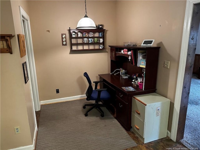 3903 Daytona Rd, Fayetteville, NC 28311 - office area featuring dark colored carpet and baseboards