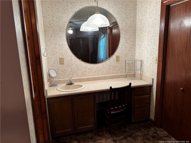 3903 Daytona Rd, Fayetteville, NC 28311 - bathroom with wallpapered walls and vanity