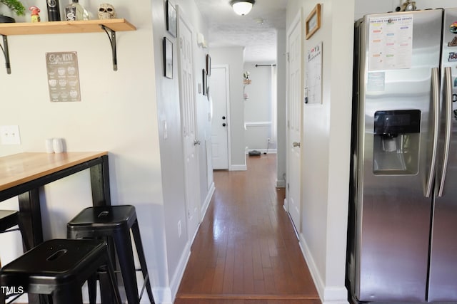 145 Ironwood Way, Raeford, NC 28376 - corridor with dark wood-style floors and baseboards