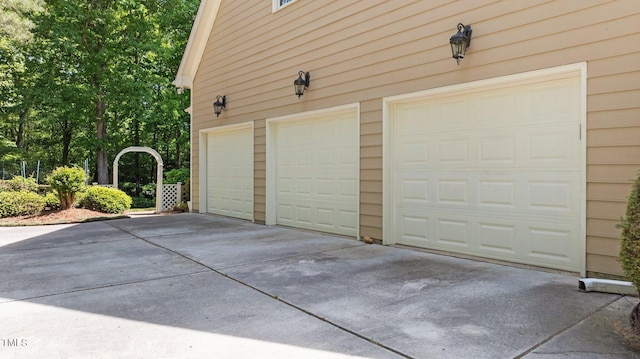 7212 Donneeford Rd, Wake Forest, NC 27587 - garage featuring driveway