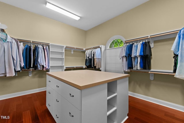 7212 Donneeford Rd, Wake Forest, NC 27587 - walk in closet with dark wood-type flooring