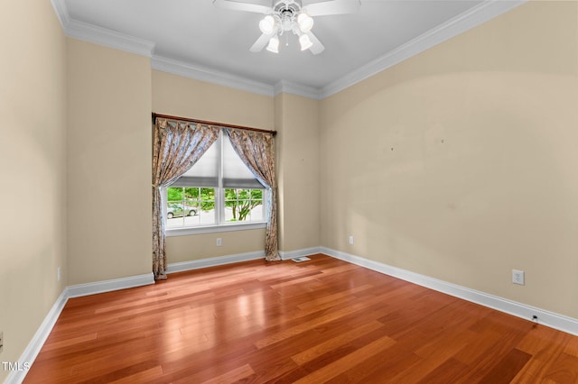 7212 Donneeford Rd, Wake Forest, NC 27587 - unfurnished room featuring ceiling fan, wood finished floors, baseboards, and ornamental molding