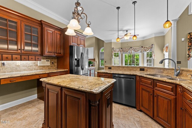 7212 Donneeford Rd, Wake Forest, NC 27587 - kitchen featuring appliances with stainless steel finishes, a sink, decorative backsplash, ornamental molding, and decorative light fixtures