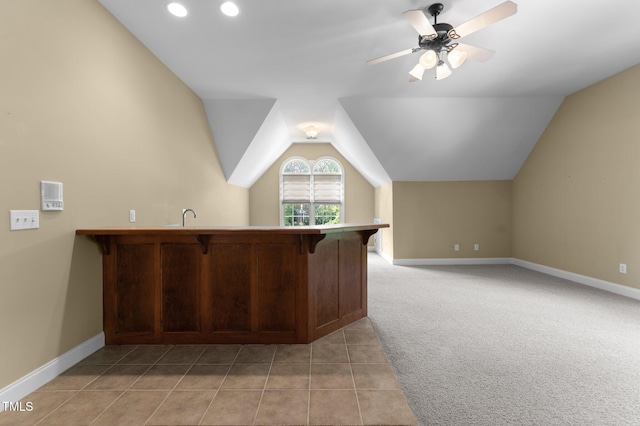 7212 Donneeford Rd, Wake Forest, NC 27587 - bonus room with lofted ceiling, light colored carpet, baseboards, light tile patterned floors, and ceiling fan