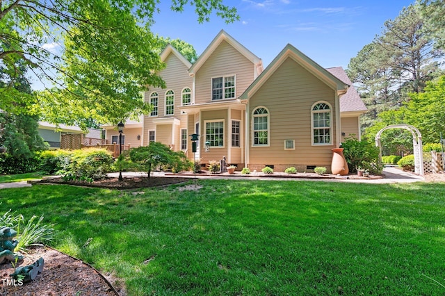 7212 Donneeford Rd, Wake Forest, NC 27587 - back of house with a lawn and crawl space