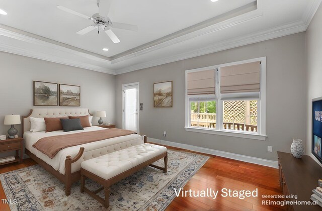7212 Donneeford Rd, Wake Forest, NC 27587 - bedroom with a raised ceiling, crown molding, recessed lighting, wood finished floors, and baseboards